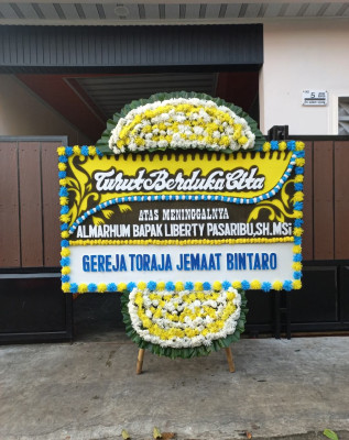 Papan Bunga Duka di Marihat Jaya